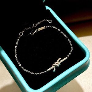 Tiffany & Co. Elegant Silver Knot Bracelet